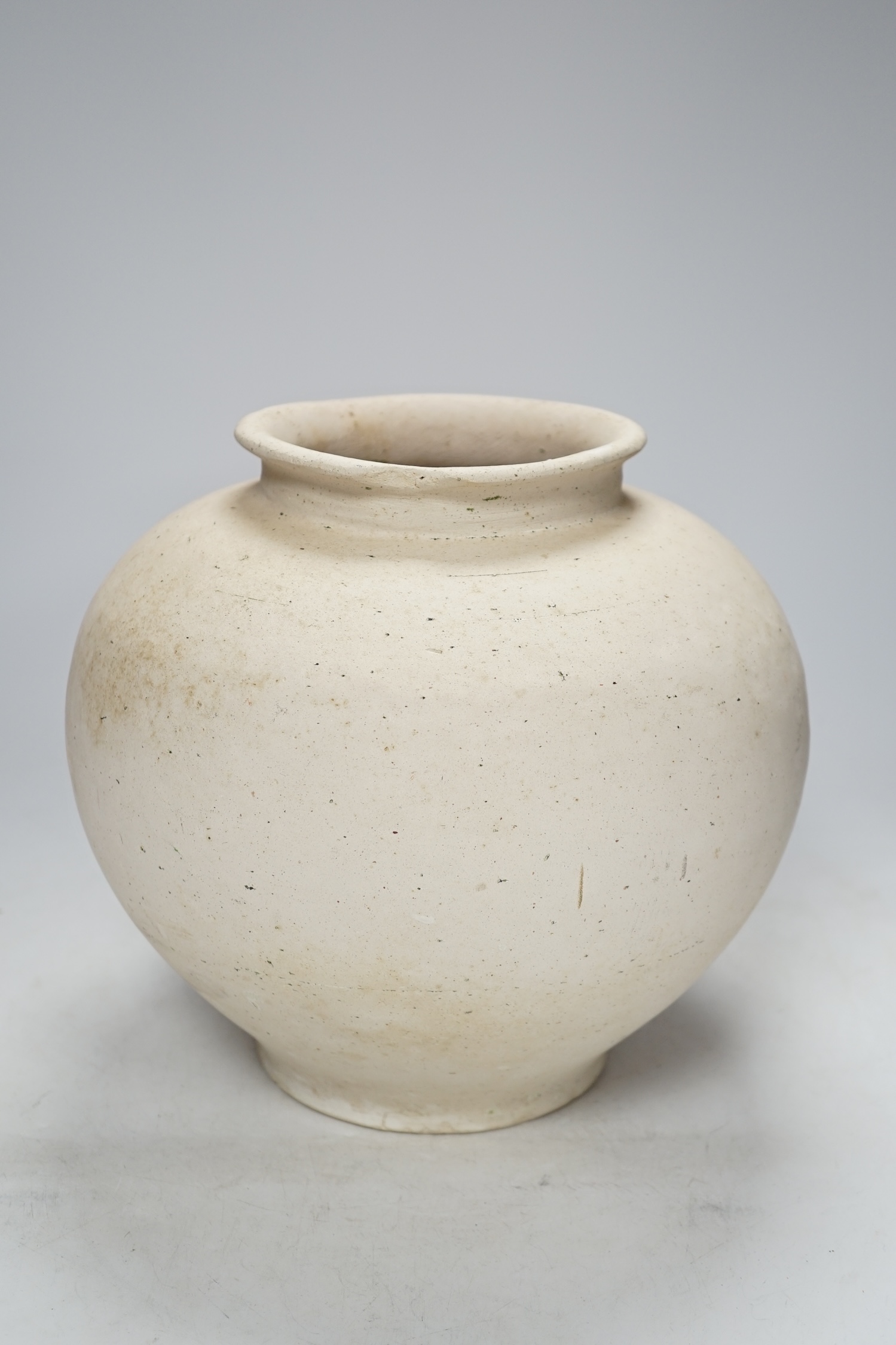 A Chinese pottery ovoid jar, Tang dynasty, 24cm